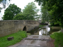 Medieval bridge crossing the River Ise. 